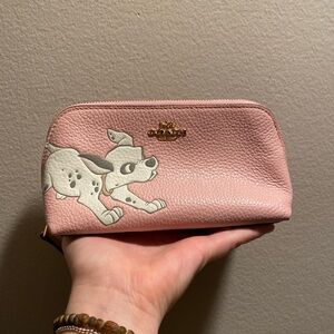 Light pink, Coach small make up bag. Disney